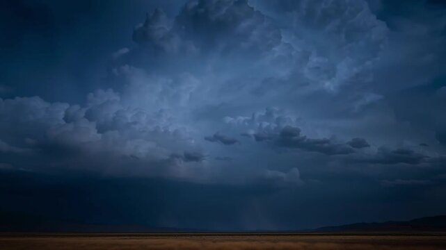 Massive thunderclouds move across evening sky with flashes of light inside, revealing dramatic storm formation over distant horizon creating cinematic atmosphere