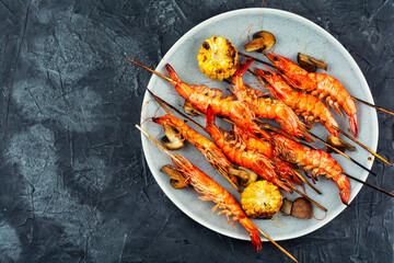 Langoustines on skewers, shrimp kebab