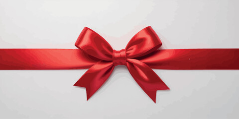 A vibrant red satin ribbon tied in a bow on a white background