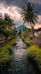 Tropical scene with river, palm trees, mountain, village, cloudy sky