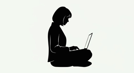 Silhouette of a woman working on a laptop, focused and engaged.