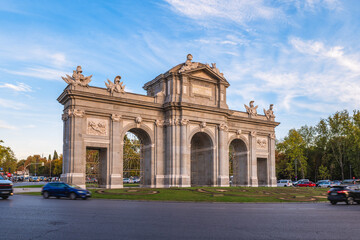 Fototapeta premium Scenery of Puerta de Alcala, Alcala Gate, in the Plaza de la Independencia in Madrid, Spain