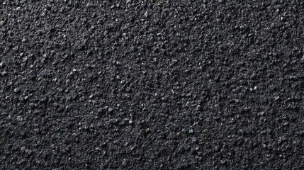 New asphalt surface shown from above, highlighting fine texture and realistic detail.