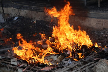 Real orange flame isolated, burning hot texture for digital art, photo editing and design overlays, dynamic energy concept.