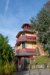 A detailed view of the Chinese Tower (Tour Chinoise) in &Eacute;pinal, an iconic architectural landmark located in the Vosges region of northeastern France. 