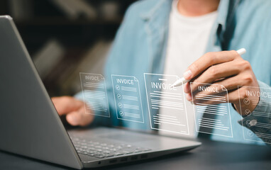 E-Invoice and Digital billing concept, Businessman using laptop to manage electronic statements on virtual screen. E-tax, Digital receipt, Online invoice processing and tax accounting solutions.