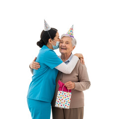 Caregiver and Elderly Woman Celebrating with a Hug – Joyful Moment of Togetherness and Festive Care