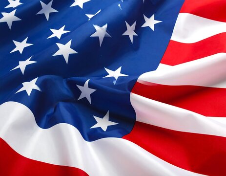 Close-up of draped flag with stars and stripes blowing in the wind