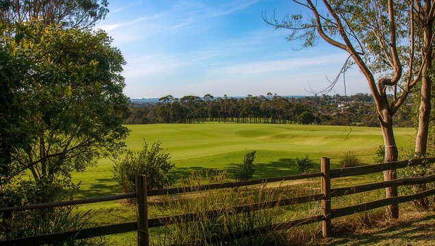 Natural boundary to a golf course, showcasing urban greenery and seasonal change