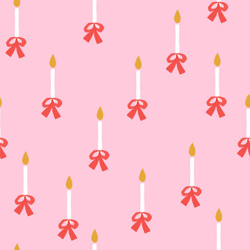 Seamless pattern with candles and red bows on a pink background. Vector hand drawn illustration.