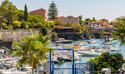 Catania, Sicily, Italy - 08 24 2025: Ognina Marina, also known as Porto Ulisse or Port Ulisse, 6kms from the centre of Catania, Sicily.