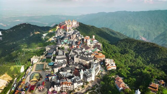 Aerial view of Ba Na Hills, cable car ride to see French Village, Debay Wine Cellar, Linh Phong Zen Monastery, Fantasy Park, Golden Bridge. Ba Na Hills is located in Da Nang, Vietnam.	