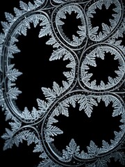 Intricate Frost Patterns on Glass: A Stunning Winter Abstract - Frozen Art, Ice Crystals, Cold Weather Detail