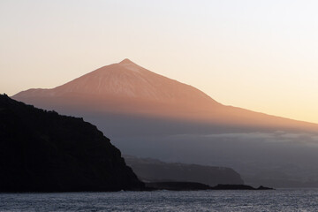 Teide Volcano at golden hour from the coast of Tenerife, Canary Islands, Spain