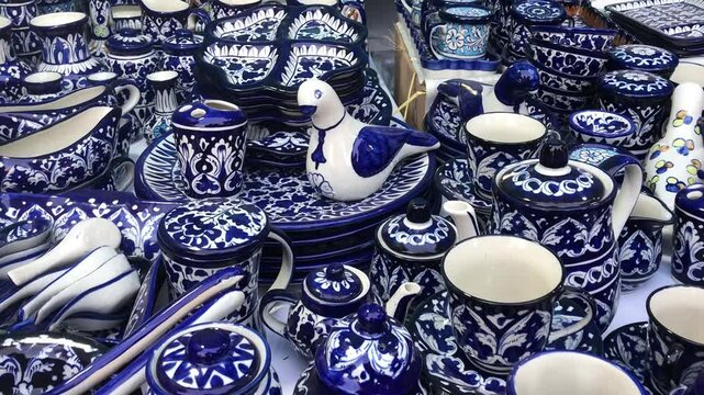 Blue Pottery on crockery a traditional art of pottery in Multan, Pakistani handicrafts work at nasarpur town Sindh, Paksiatn