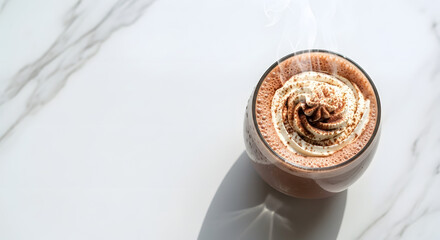 Indulgent hot chocolate with whipped cream and cocoa powder, steaming warmly on a bright, modern surface, perfect for cozy moments.