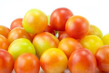 red and yellow tomatoes on white, Close up pile of tomatoes isolated on white background stack 