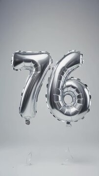 Silver balloon number 76 for birthday or anniversary party