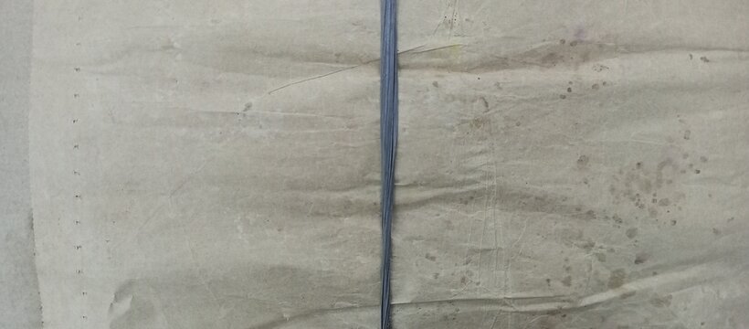 Old Brown Wrinkled Paper Wrapped Parcel Tied String - Powered by Adobe