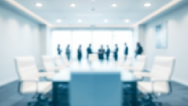 Blurred business meeting in a modern conference room with natural light