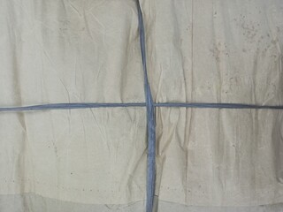 Tightly Tied Brown Kraft Paper Parcel Knot Background