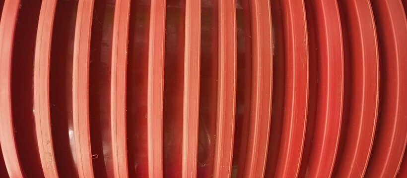 Vibrant Red Vertical Lines Curved Pattern Abstract Background