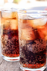 Soft drink cola with iced on glass