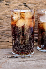Soft drink cola with iced on glass