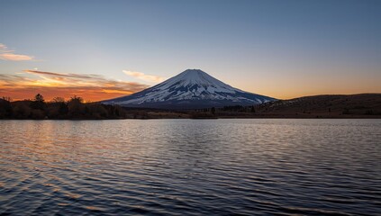 Naklejka premium Winter sunset over Mt. Fuji, showcasing the seasonal beauty of nature