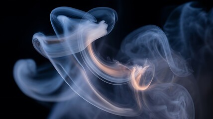 Fototapeta premium Soft swirling smoke rising in elegant flowing shapes on dark background 