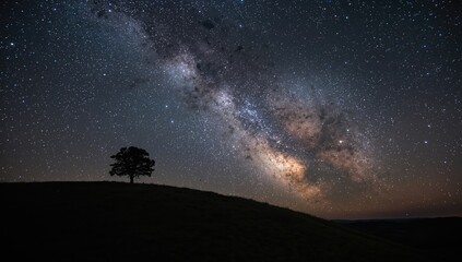 Scenic hillside silhouette under a starry night sky, ideal for serene backdrops