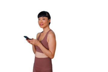 Professional woman with curly hair giving a confident speech, explaining a concept during a presentation, holding a tablet