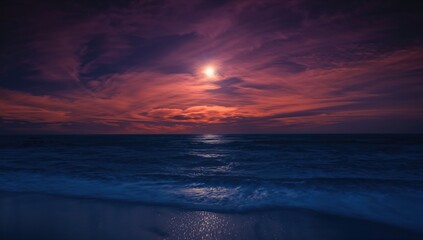 Obraz premium Moonlit reflection on ocean waves and fiery sky, long exposure technique