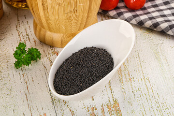 Black dry Nigella seeds in the bowl