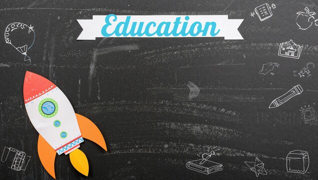 School return concept with paper rocket on chalkboard background, top view flat lay banner