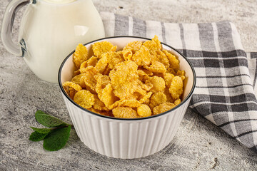 Corn flakes with milk for breakfast