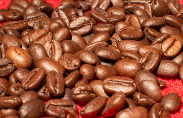 Coffee beans on a red background