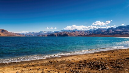 Pangong Lake landscape featuring serene water and mountains, showcasing natural beauty and travel inspiration © Giovanni