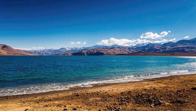 Pangong Lake landscape featuring serene water and mountains, showcasing natural beauty and travel inspiration