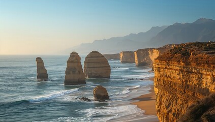 Seaside rock formations beneath a misty atmosphere, erosion risk