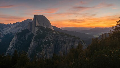 Mountains silhouetted against the sunset sky, reflecting seasonal change