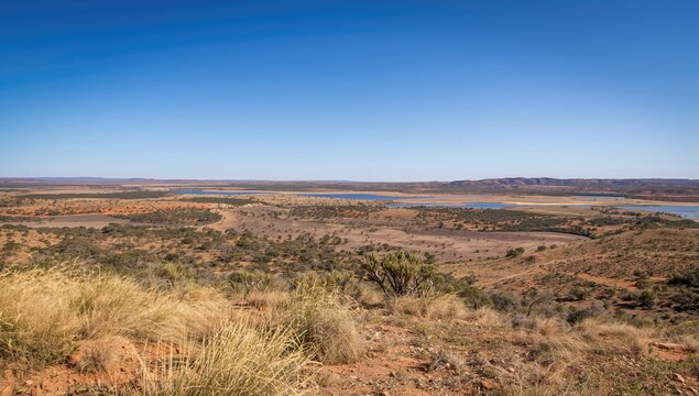 A scenic landscape of Mungo Lakes showcasing arid terrain, ideal for travel and exploration, World Environment Day