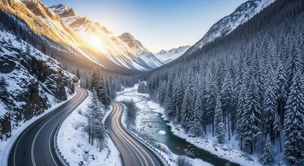 Winter landscape with winding road and river in snowy mountains at sunrise