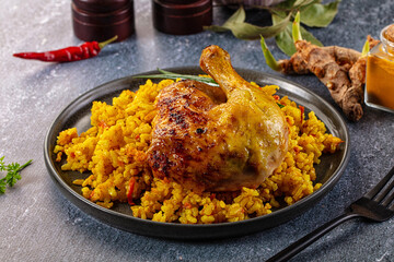 Roasted chicken leg with yellow rice