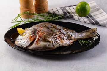 Baked dorada fish with spices