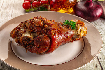 Baked pork knuckle with spices