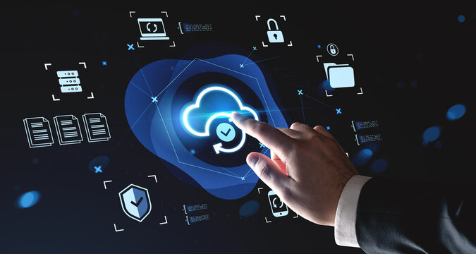 Hand interacting with glowing digital cloud icon surrounded by data and security symbols on futuristic interface concept background for cloud computing.