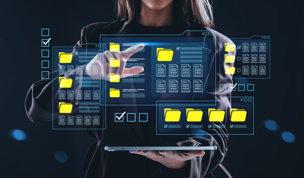 Businesswoman interacting with digital document folders using fu