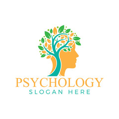 Obraz premium Psychology logo featuring a tree with colorful leaves inside a head silhouette, representing mental health and wellbeing