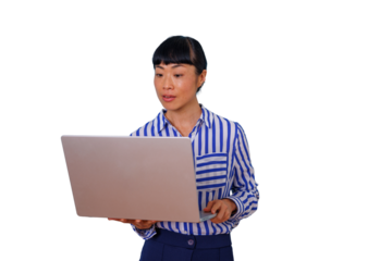 Female doctor wearing a lab coat and stethoscope, working on a laptop, standing with a transparent background